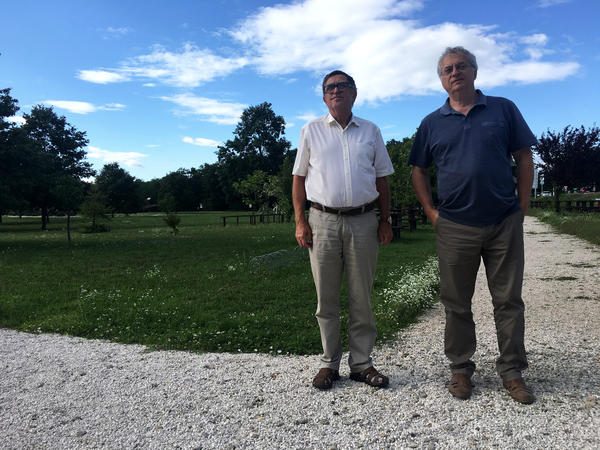 Laszlo Magas (left) and Laszlo Nagy stand near the Hungary-Austria border, which young protesters opened in 1989. Both men were anti-communists during the Soviet period and sought an opening to the West.