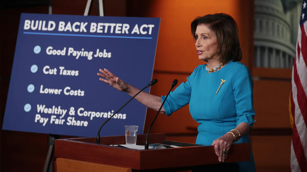 House Speaker Nancy Pelosi, D-Calif., talks to reporters ahead of House passage of Democrats' Build Back Better Act, which now faces changes in the Senate.
