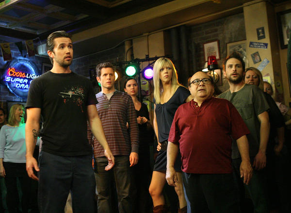 Actors Rob McElhenney, Glenn Howerton, Kaitlin Olson, Danny DeVito and Charlie Day act during a dance scene on the set of "It's Always Sunny In Philadelphia" in 2007 in Los Angeles, Calif.