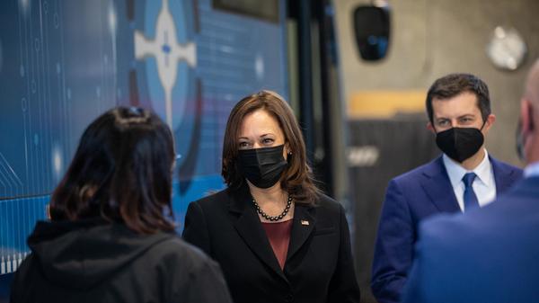 Vice President Harris and Transportation Secretary Pete Buttigieg tour electric vehicle operations at a Charlotte Area Transit System bus garage on Thursday. The two were in North Carolina to promote the new infrastructure law.