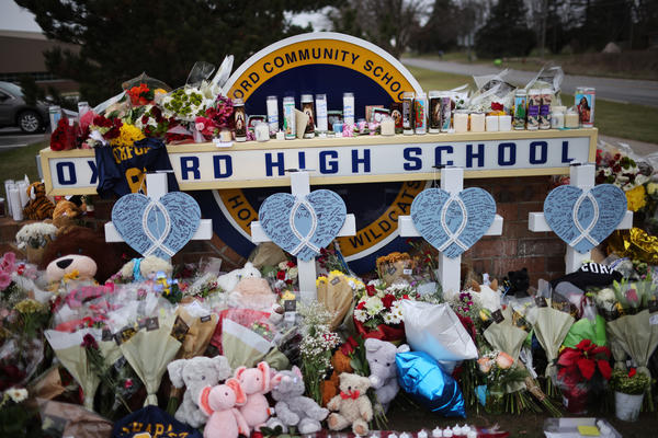 A memorial has been set up outside Oxford High School in Michigan, where four students were killed in a mass shooting Tuesday.