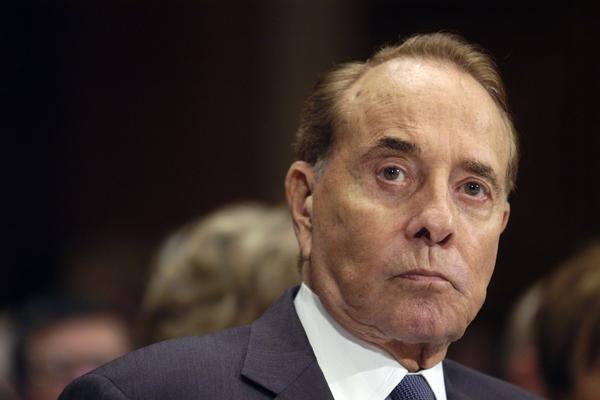 Bob Dole testifies before a Senate committee in 2007. The 1996 Republican presidential nominee and longtime GOP Senate leader has died.