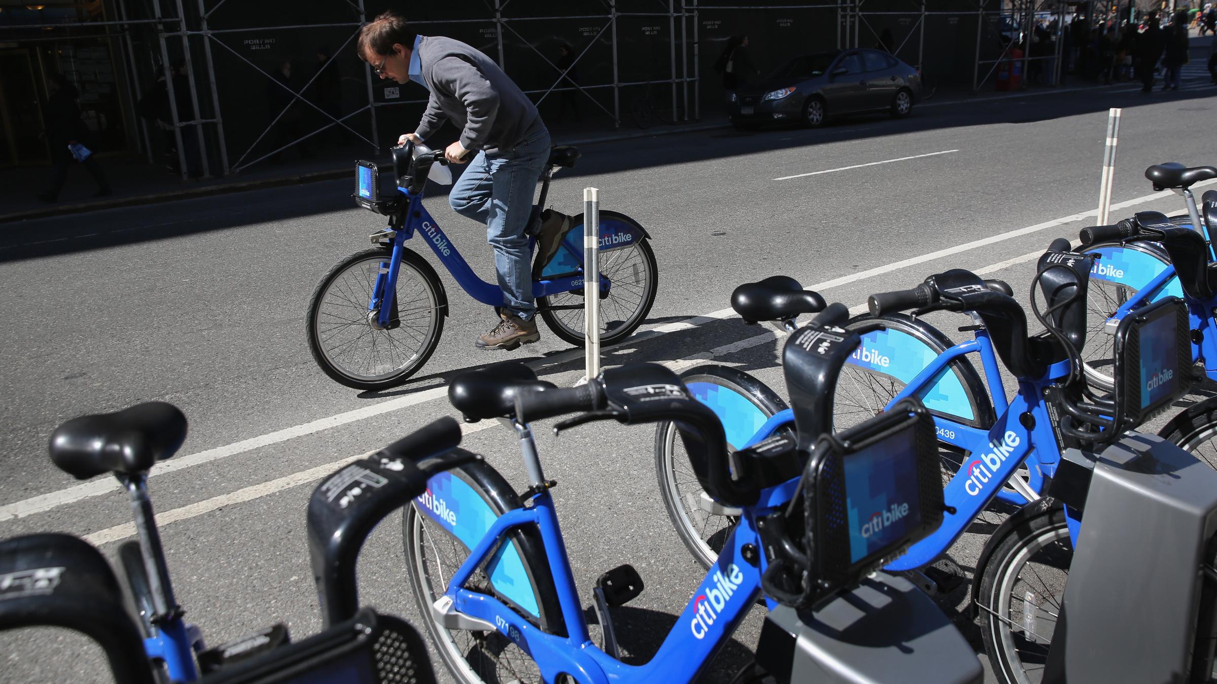 firm buys big bike-share service; expansion and higher rates