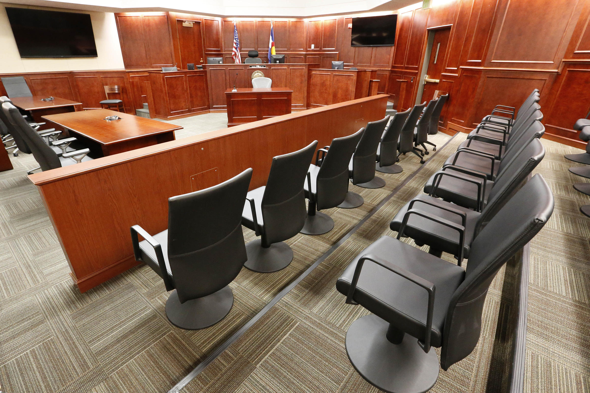 a view of the jury box, right, inside courtroom 201, where jury