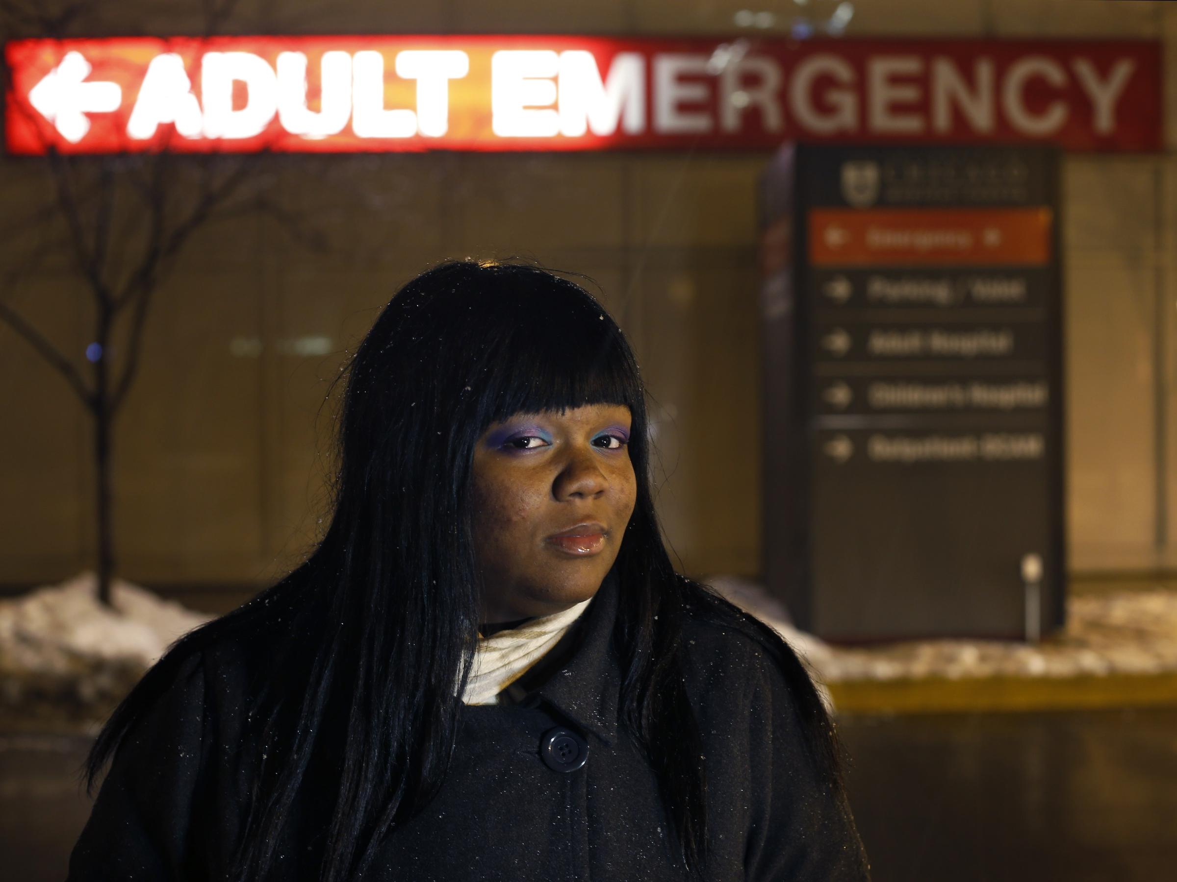 veronica morris-moore stands outside the adult emergency room at