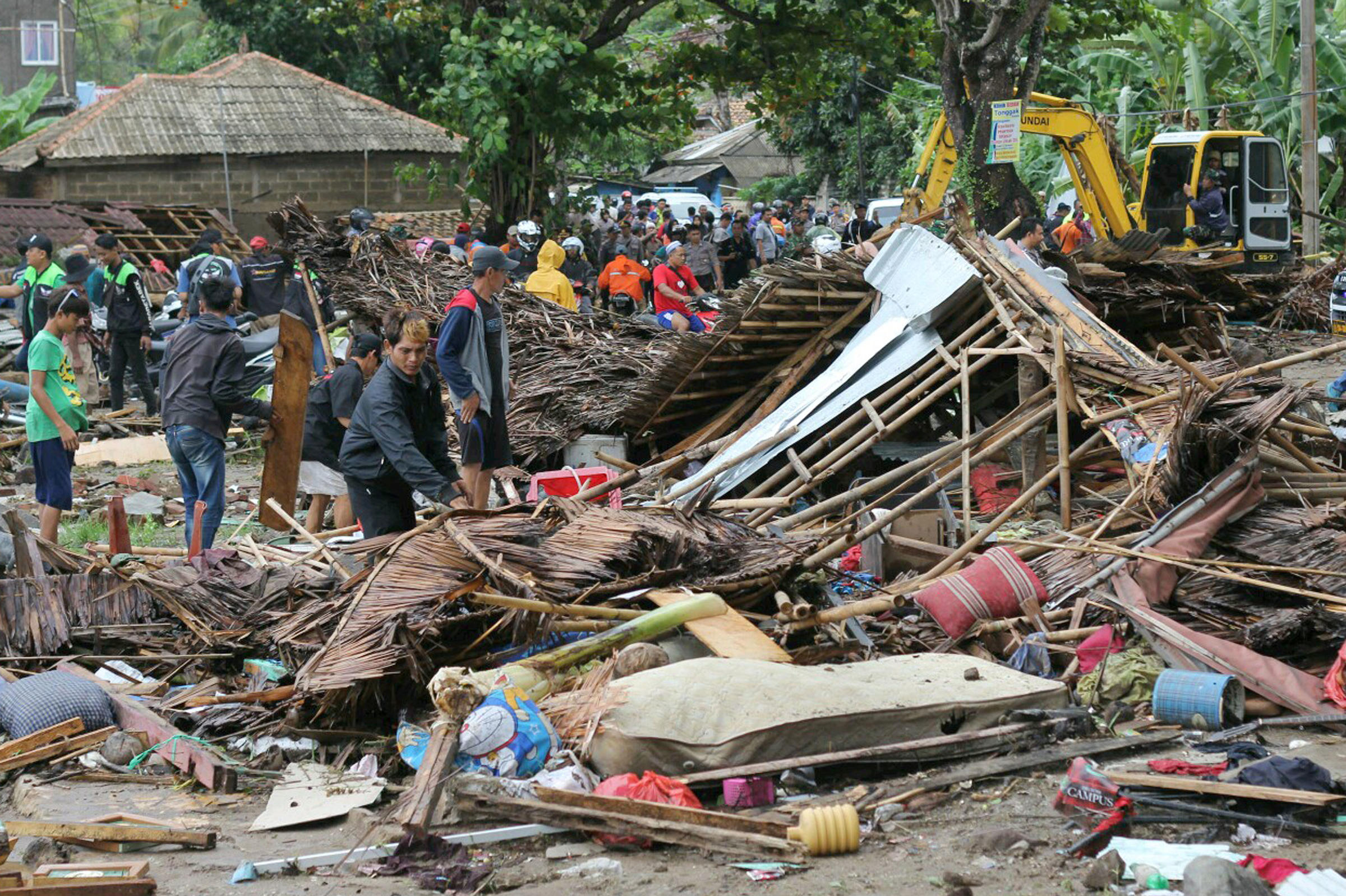 death toll rises, hundreds dead after tsunami hits indonesia
