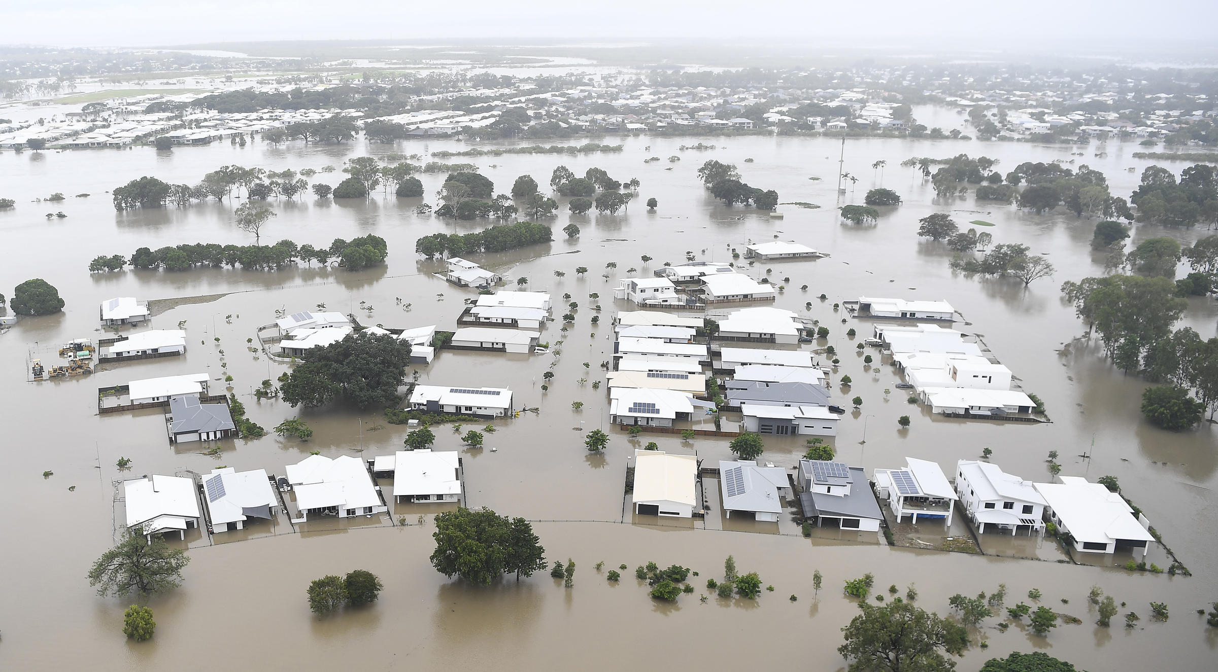 Australian Residents Return Home After Flash Floods, Amid Warnings Of