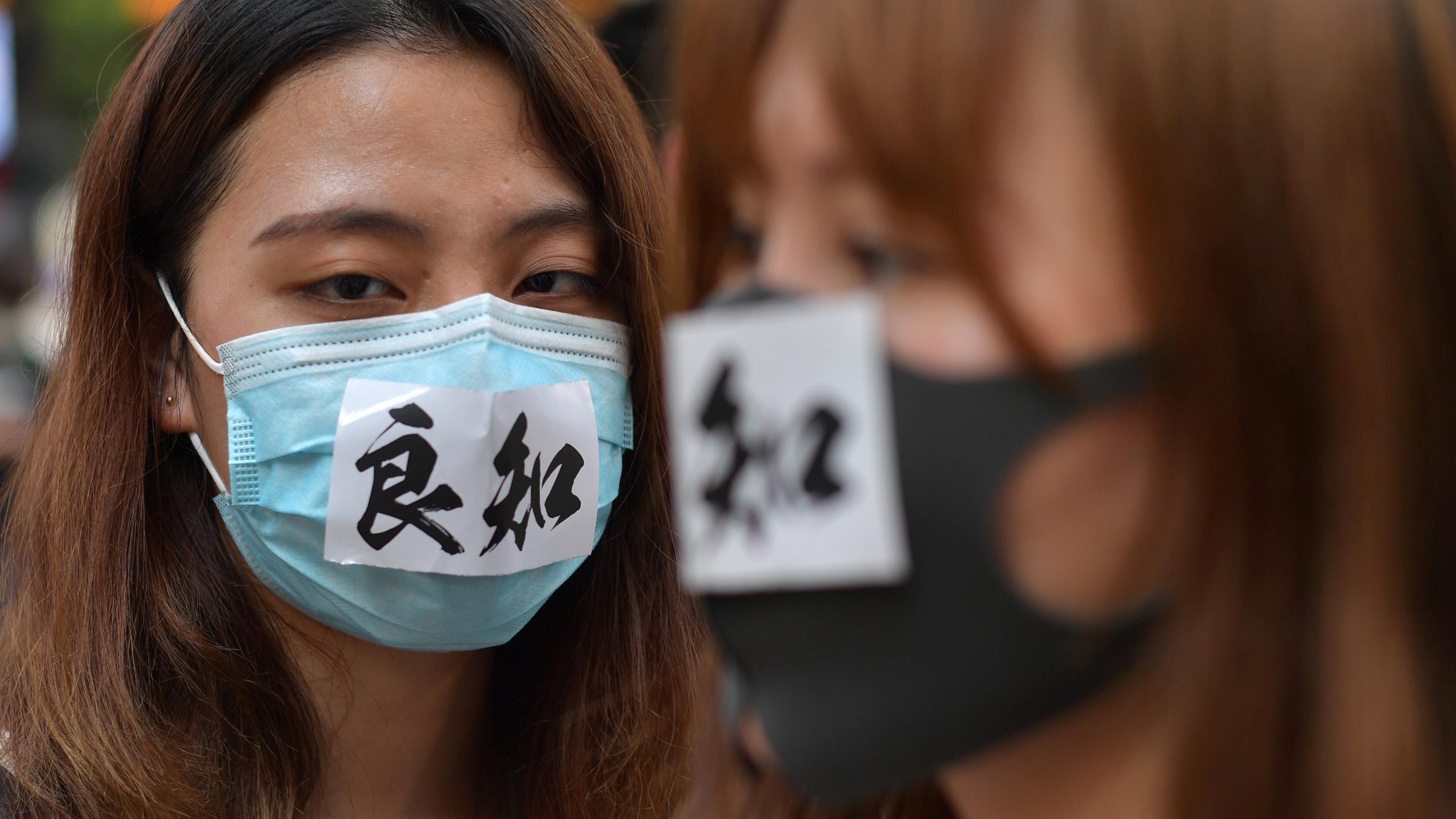 Hong Kong Bans Face Masks At Public Assemblies WPSU