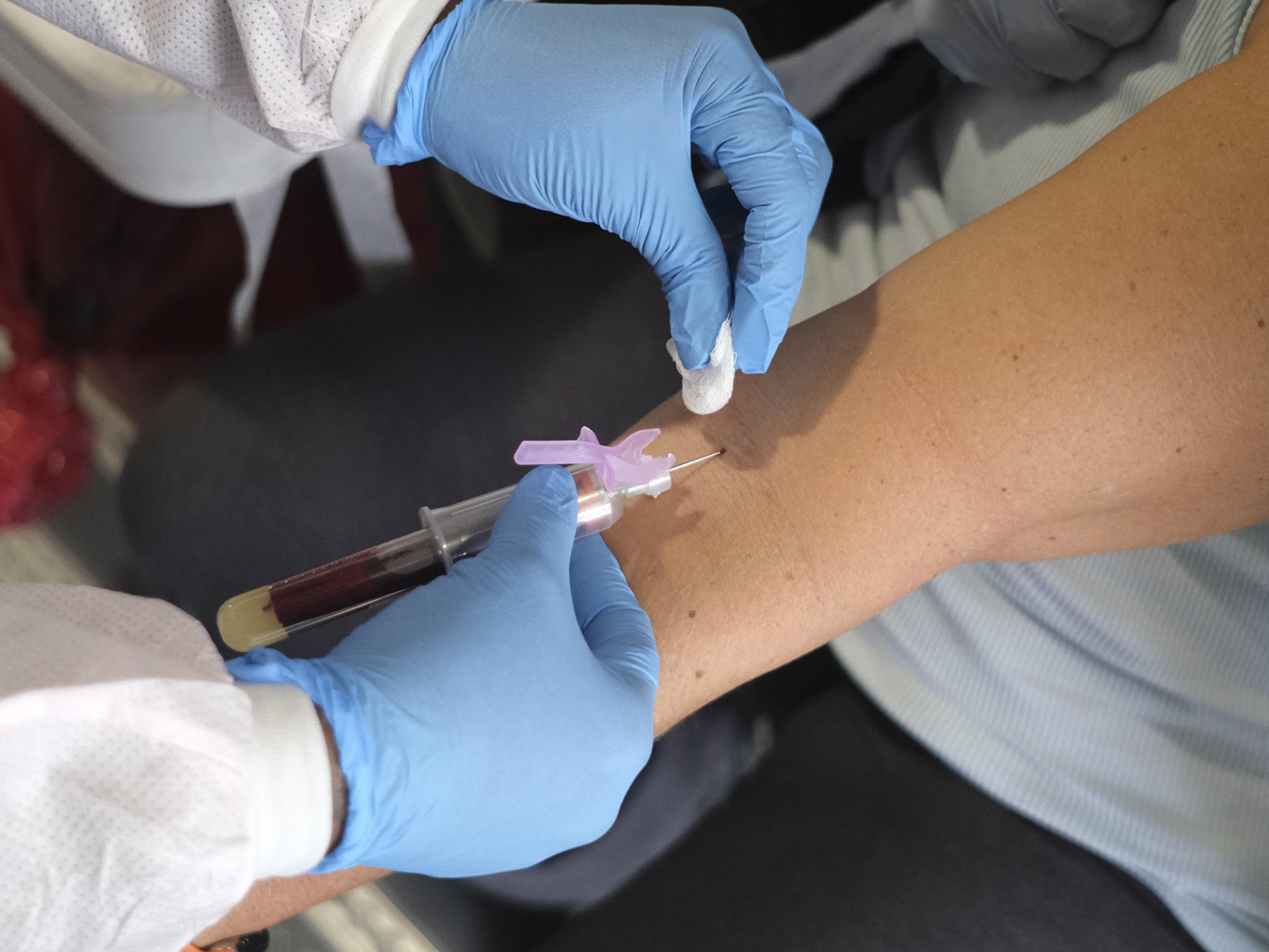 of the jersey city police department has blood drawn to test for