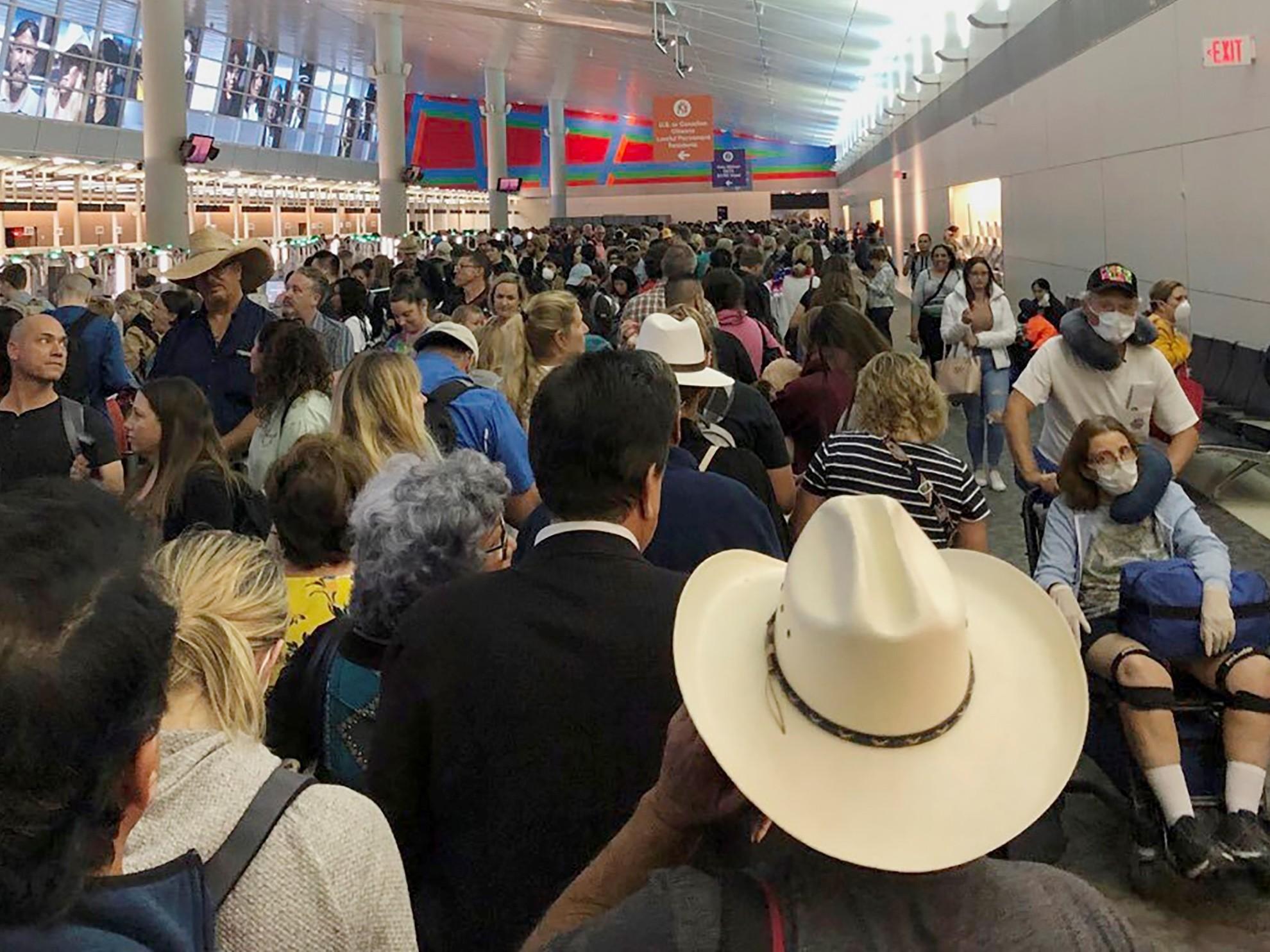 Travelers Greeted With HoursLong Airport Lines As Coronavirus