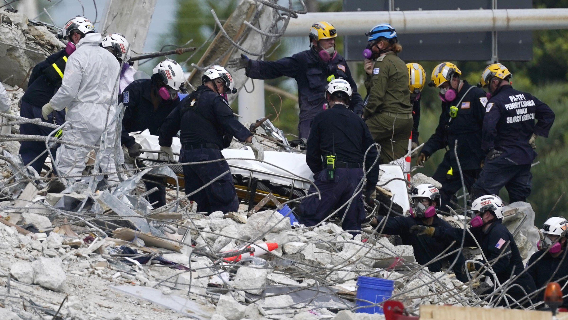 Firefighters Searching Condo Rubble Are Facing Physical And Emotional ...
