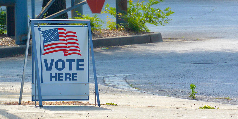 A 'vote here' sign near Smitha Middle School in the city of Marietta. The city voted July 12 to impose term limits of three consecutive four-year terms on council members and the position of mayor.