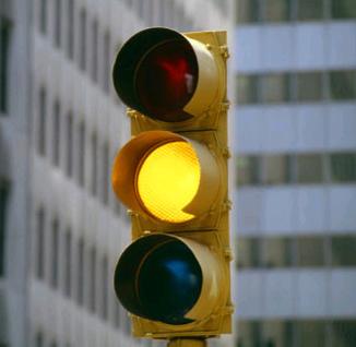 Extending the time for yellow lights could drop red-light camera ...