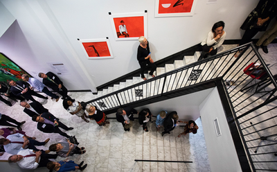 Cuban American Artist Exhibit Opens In Downtown Jacksonville Wjct News Private Opening For Harvard Yale Princeton And Cornell Alumni At The Wall Street Fine Art Gallery Downtown Artist Of Three Red Paintings Is