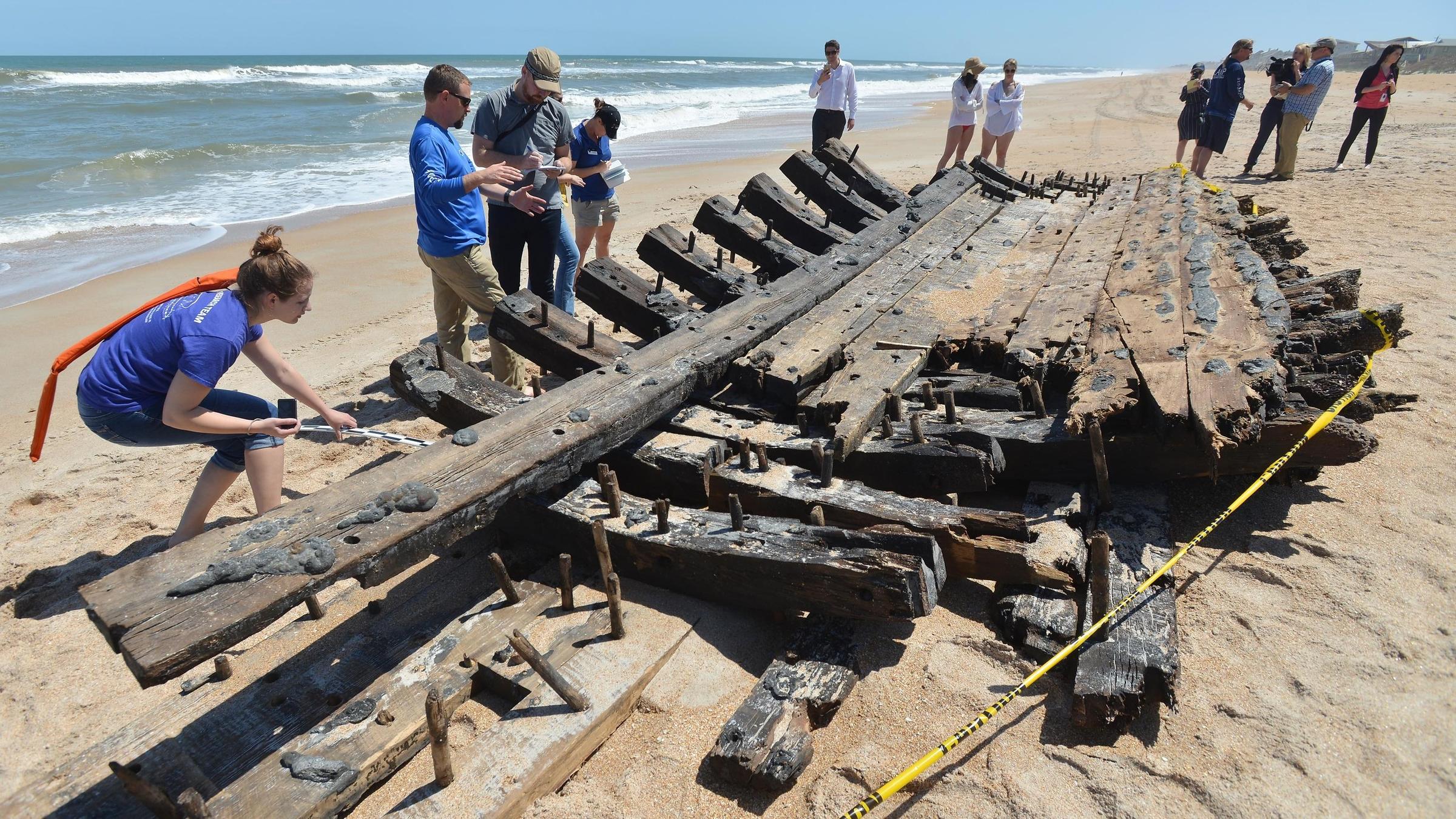 suspected centuries old shipwreck washes ashore in