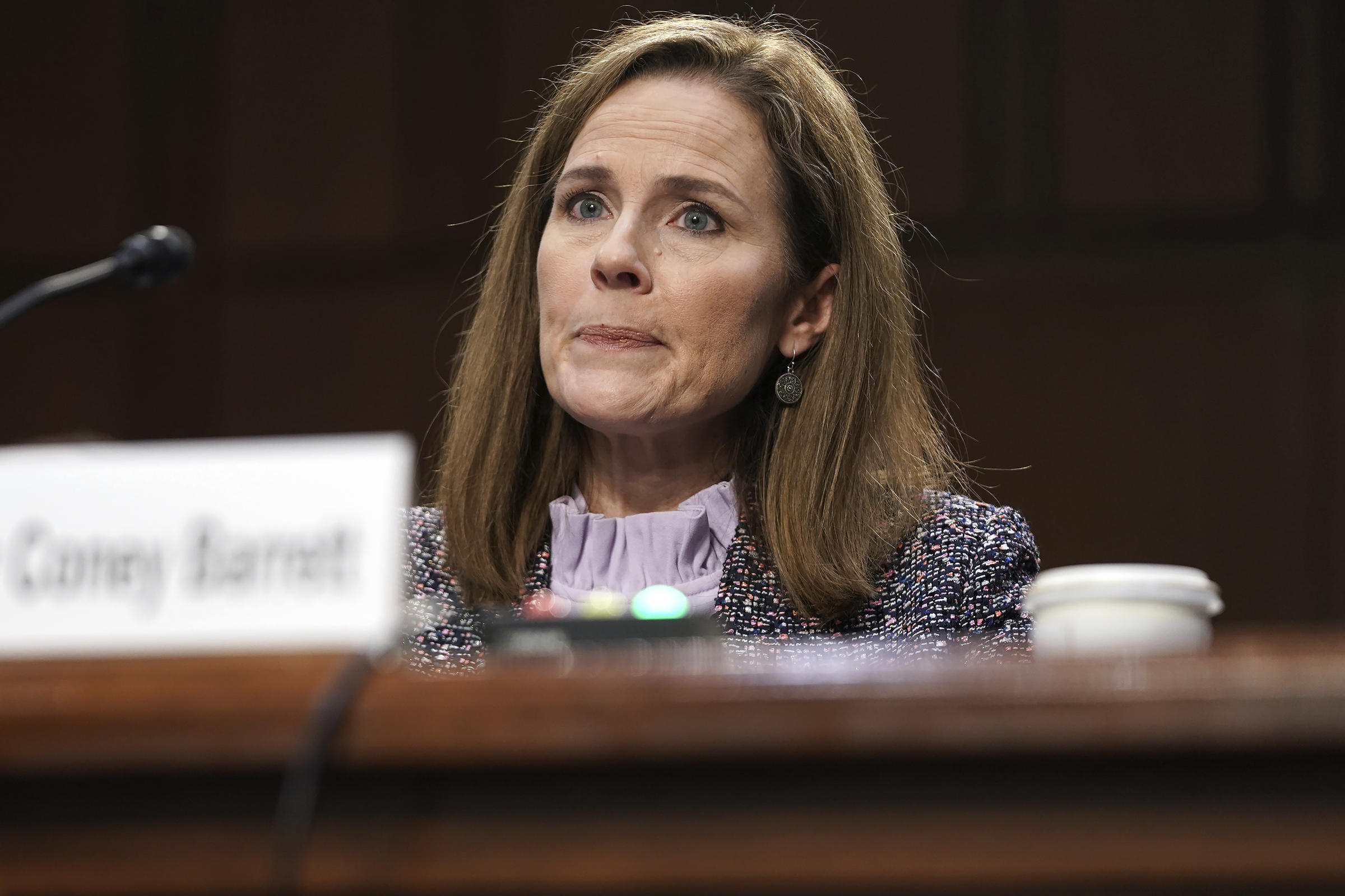 Supreme Court nominee Amy Coney Barrett speaks during a confirmation hearin...
