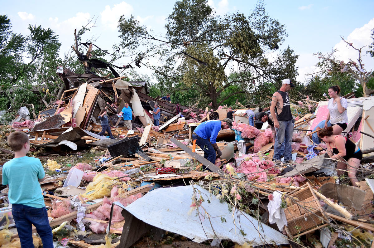 PHOTOS Mayfield Hit Hard by Tuesday Tornado, Man Survives Holding Onto
