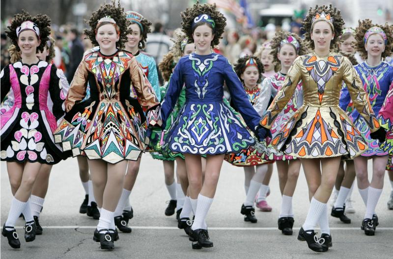 Fast feet, curly wigs, and straight arms: Learn more about Irish dance ...