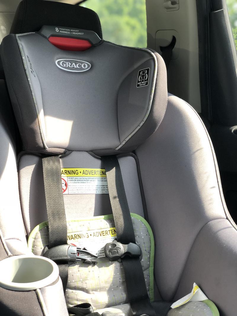 rear facing car seat in front seat of truck