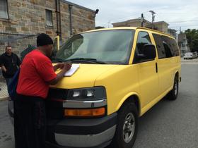 ACOS' bright yellow van, easily recognizable as it makes the rounds to locations throughout Rhode Island several days a week.