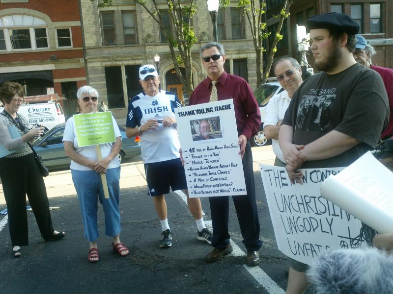Group protests Archdiocese teacher contract WVXU